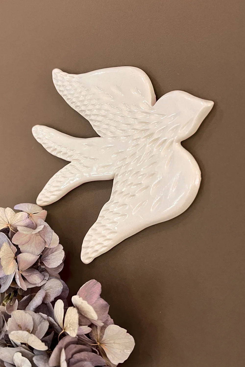 Biankaléone Hirondelle au doux plumage 16x17 cm